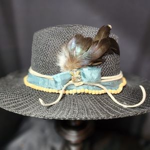 Black mesh decorated hat